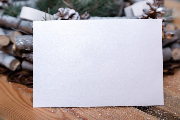 stock image Christmas card on the table near the Christmas decor