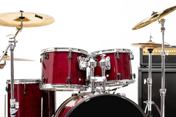 Drum set on white background. Set of musical instruments