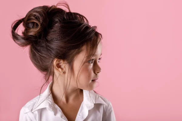 Happy little girl in white shirt with beautiful hairstyle — Stock Photo, Image