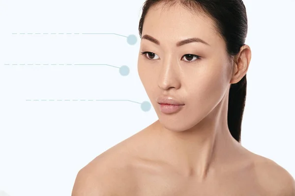 Asian young, beautiful and natural woman with dotted arrows on her face — Stock Photo, Image