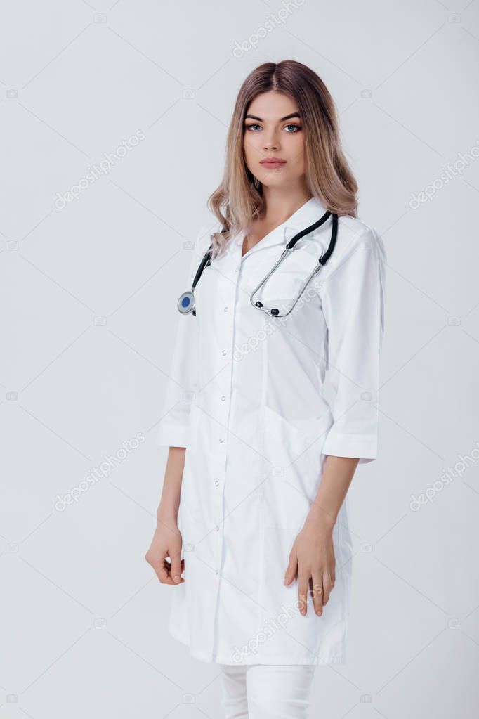 doctor woman in white coat with stethoscope