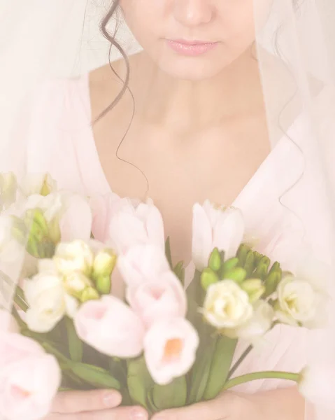 Wedding bouquet of tulips in brides hands — Stock Photo, Image