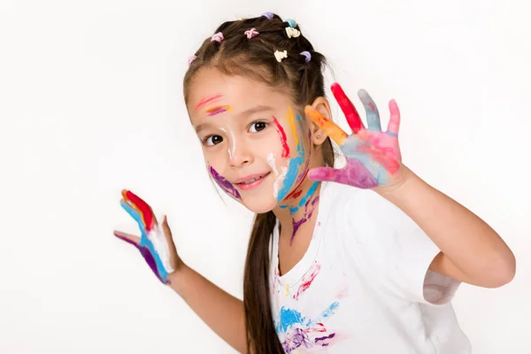 Kind meisje met handen geschilderd in kleurrijke verf — Stockfoto