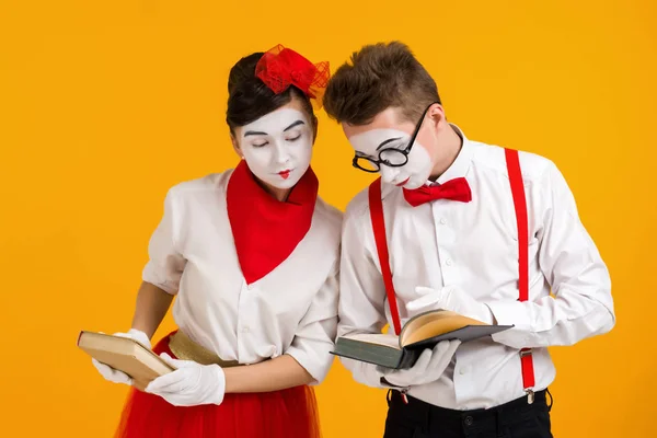 portrait of mime couple artist with book