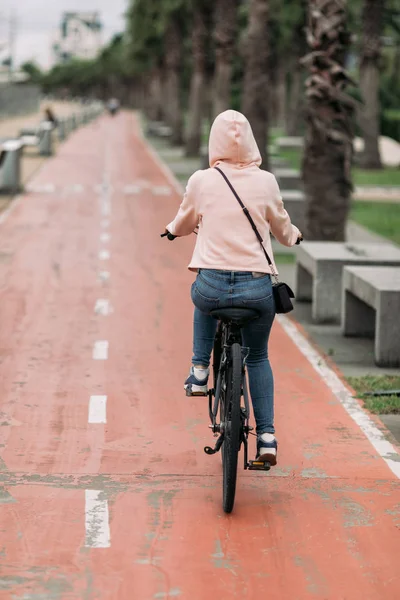 cyclist on a bike path on the embankment