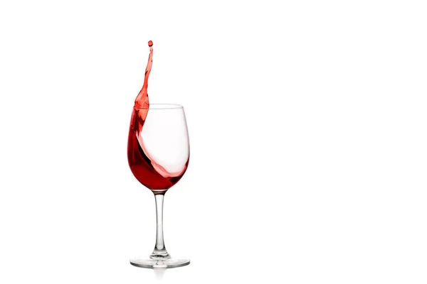 Schizzo di vino rosso nel bicchiere — Foto Stock