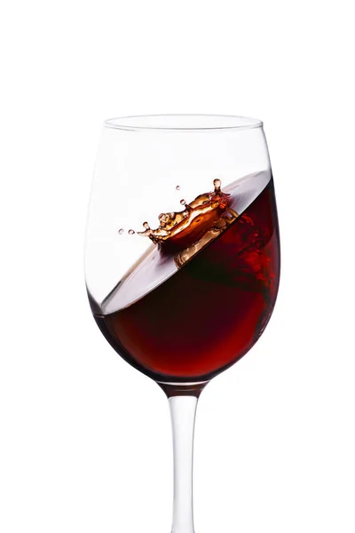 Stänk av rött vin i glas — Stockfoto