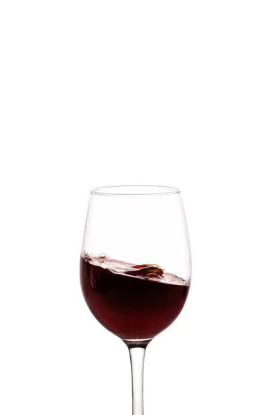 Splash of red wine in glass — Stock Photo, Image