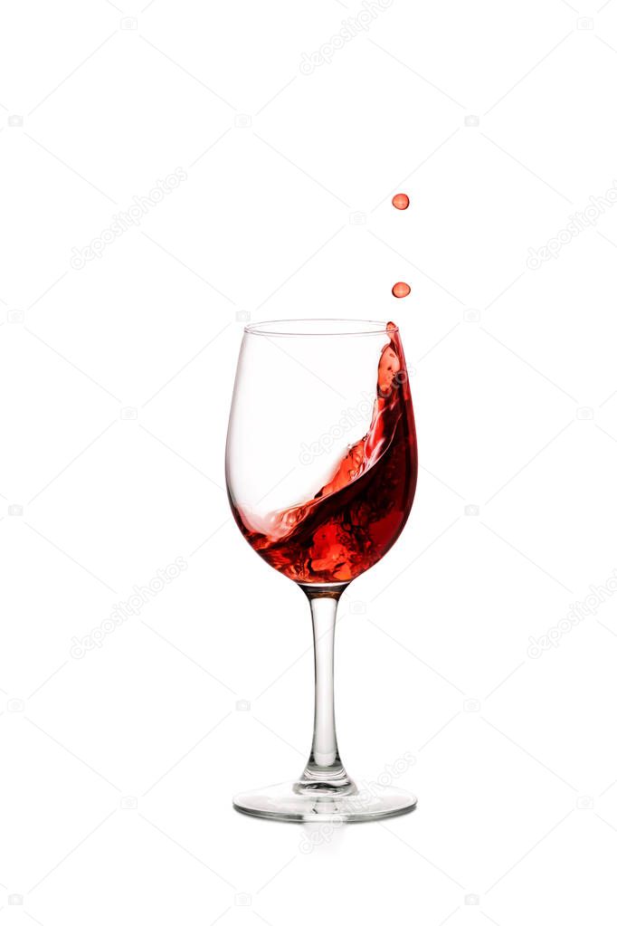 splash of red wine in glass