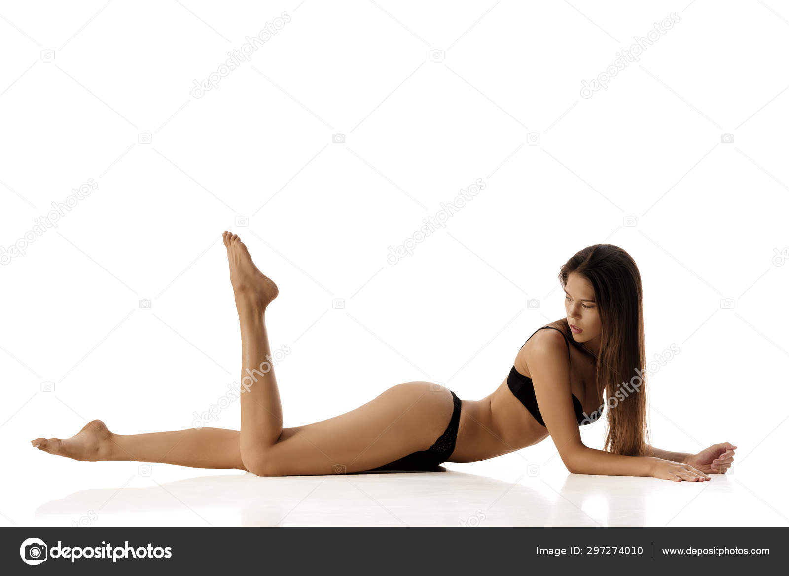 Perfect brunette woman with long naked legs Stock Photo by Â©erstudio  297274010