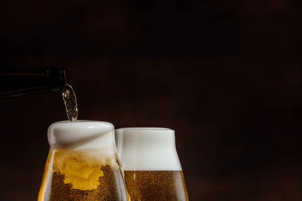 Two glasses of cold golden beer — Stock Photo, Image