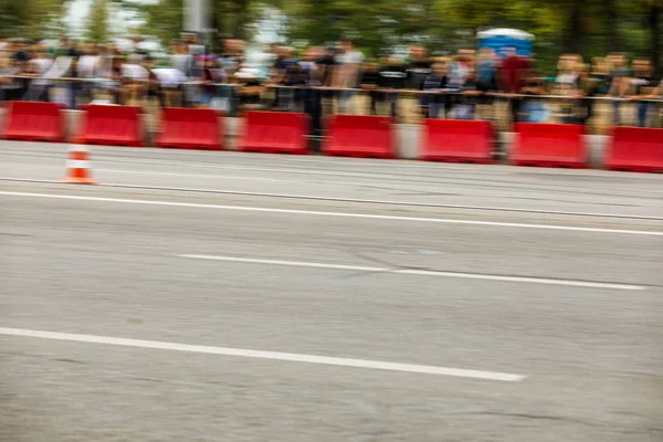 Fundo borrão de tribuno na pista de corrida — Fotografia de Stock