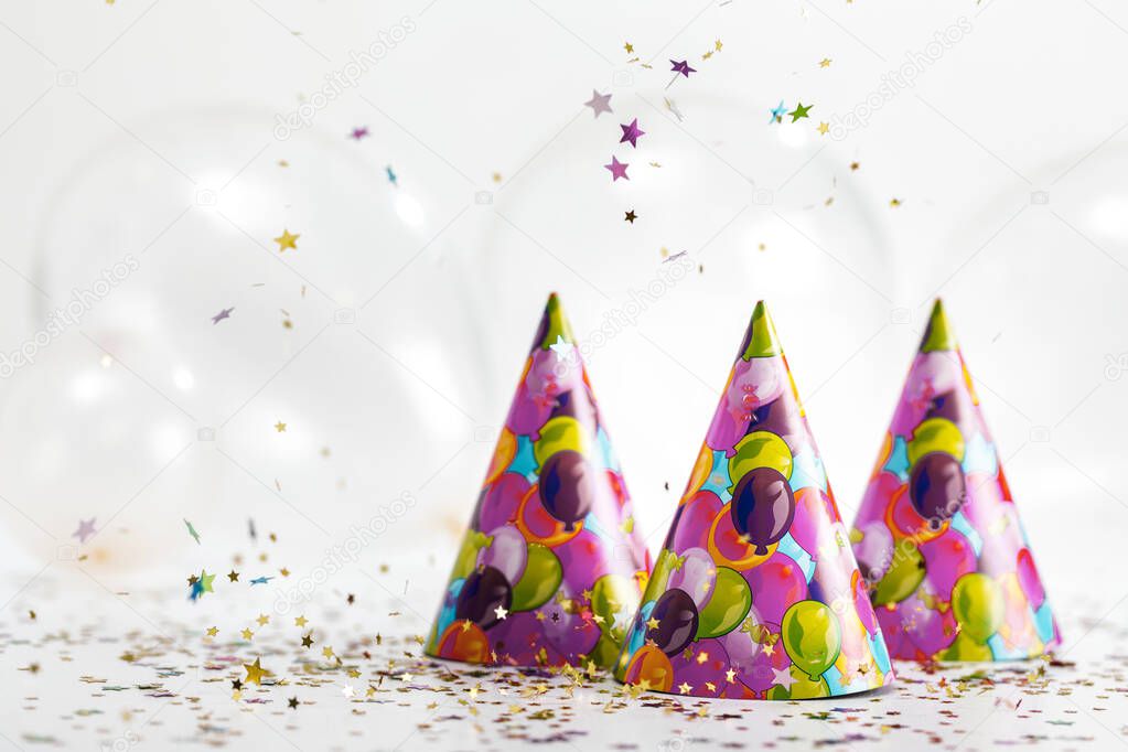 confetti and party hat. copy space