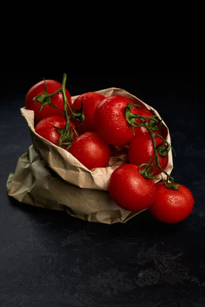 Red tomatoes in paper bag — Stock Photo, Image