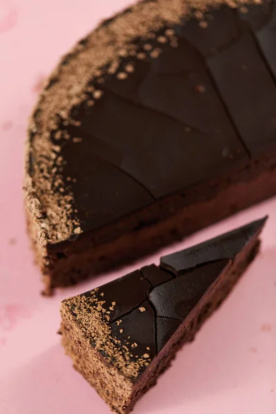Chocolate cake with cut piece — Stock Photo, Image