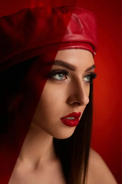 Woman in red leather beret — Stock Photo, Image