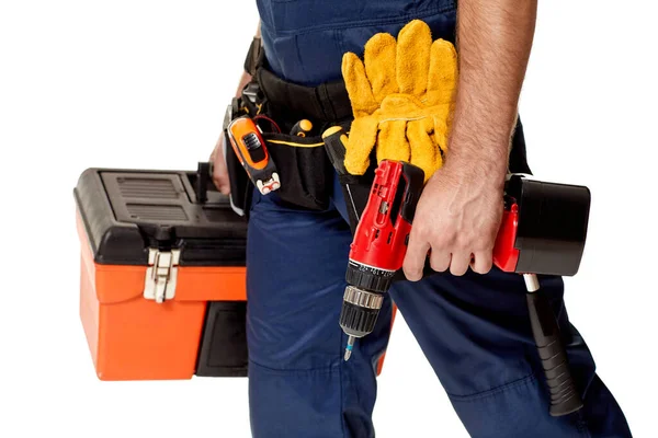 Reparateur met accuschroevendraaier en gereedschapskist. — Stockfoto
