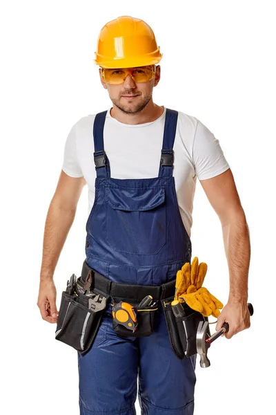 Repairman worker in yellow hard hat and uniform. — Stock Photo, Image