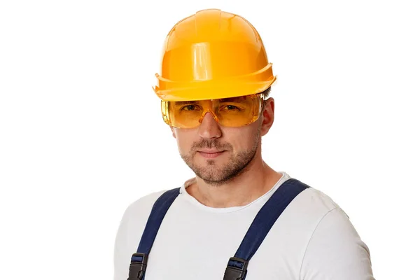 Portrait of caucasian man construction worker in yellow hard hat — Stock Photo, Image