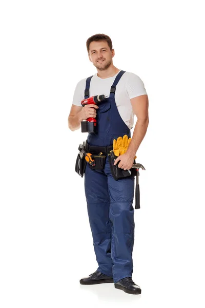 Young caucasian repairman worker holding cordless screwdriver — Stock Photo, Image