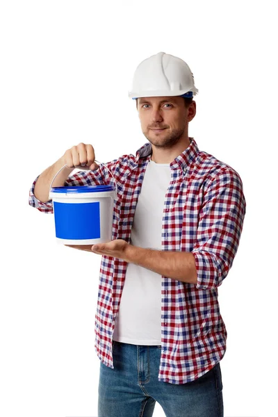 Worker holding can with paint. — Stock Photo, Image