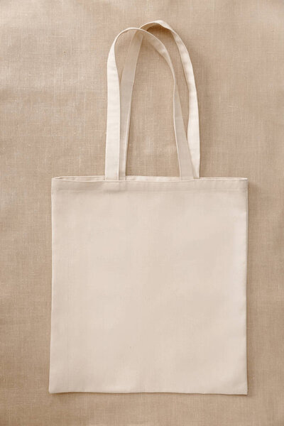 Blank canvas tote bag, design mockup with copy space. Handmade shopping bags.