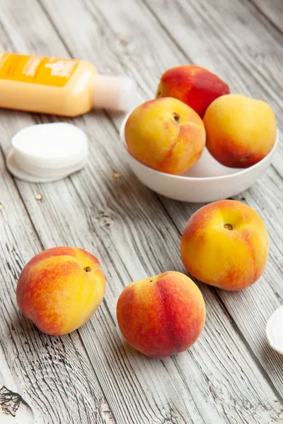 Personal care, cosmetics, cream of peach, ripe peaches, cotton b