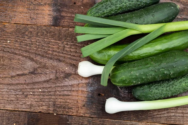 Board Green Cucumbers Young Onions — Stock Photo, Image