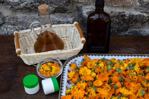 Calendula Flowers Tray Nearby Two Jars Cream Bottle Oil — Stock Photo, Image