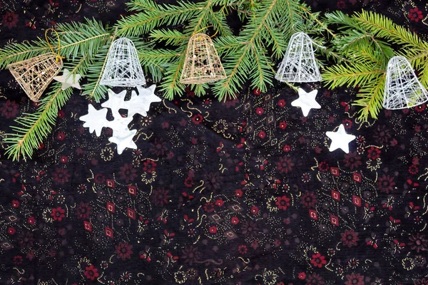 Fir Branches Five New Year Bells Lie Dark Velvet Fabric — Stock Photo, Image