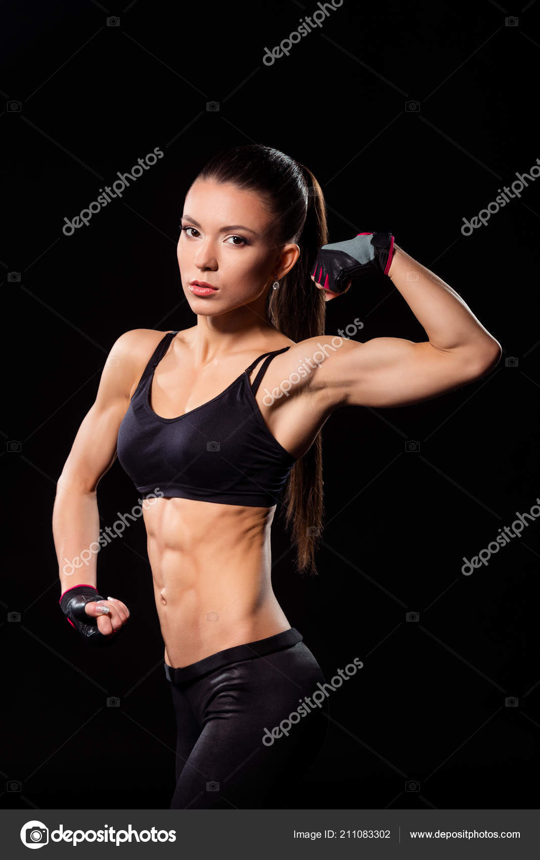 Young Female Flexing Bicep Stock Photo Young Female Flexing Bicep Stock Photo