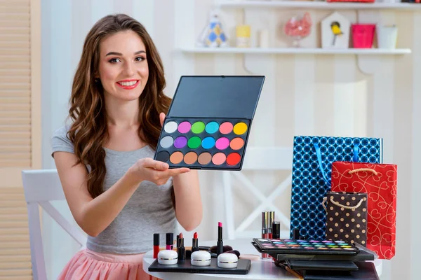 Woman and professional cosmetics — Stock Photo, Image