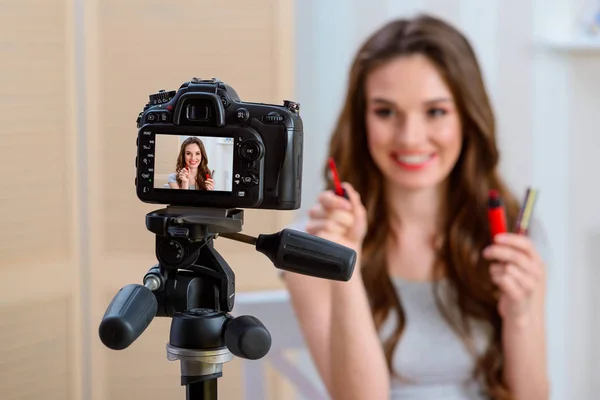 Image of woman in camera — Stock Photo, Image
