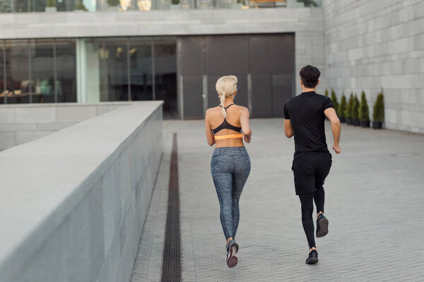 Couple running in the city