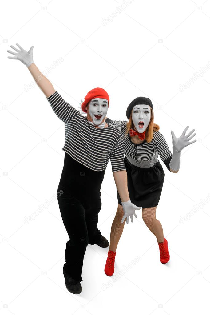 Two mimes are having fun
