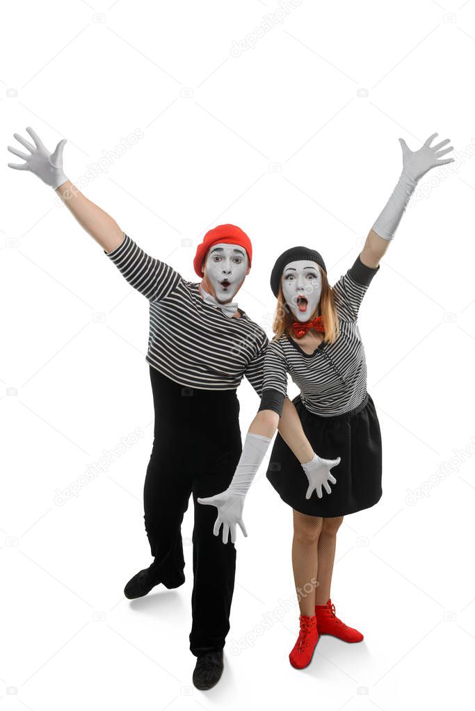 Portrait of two happy mimes