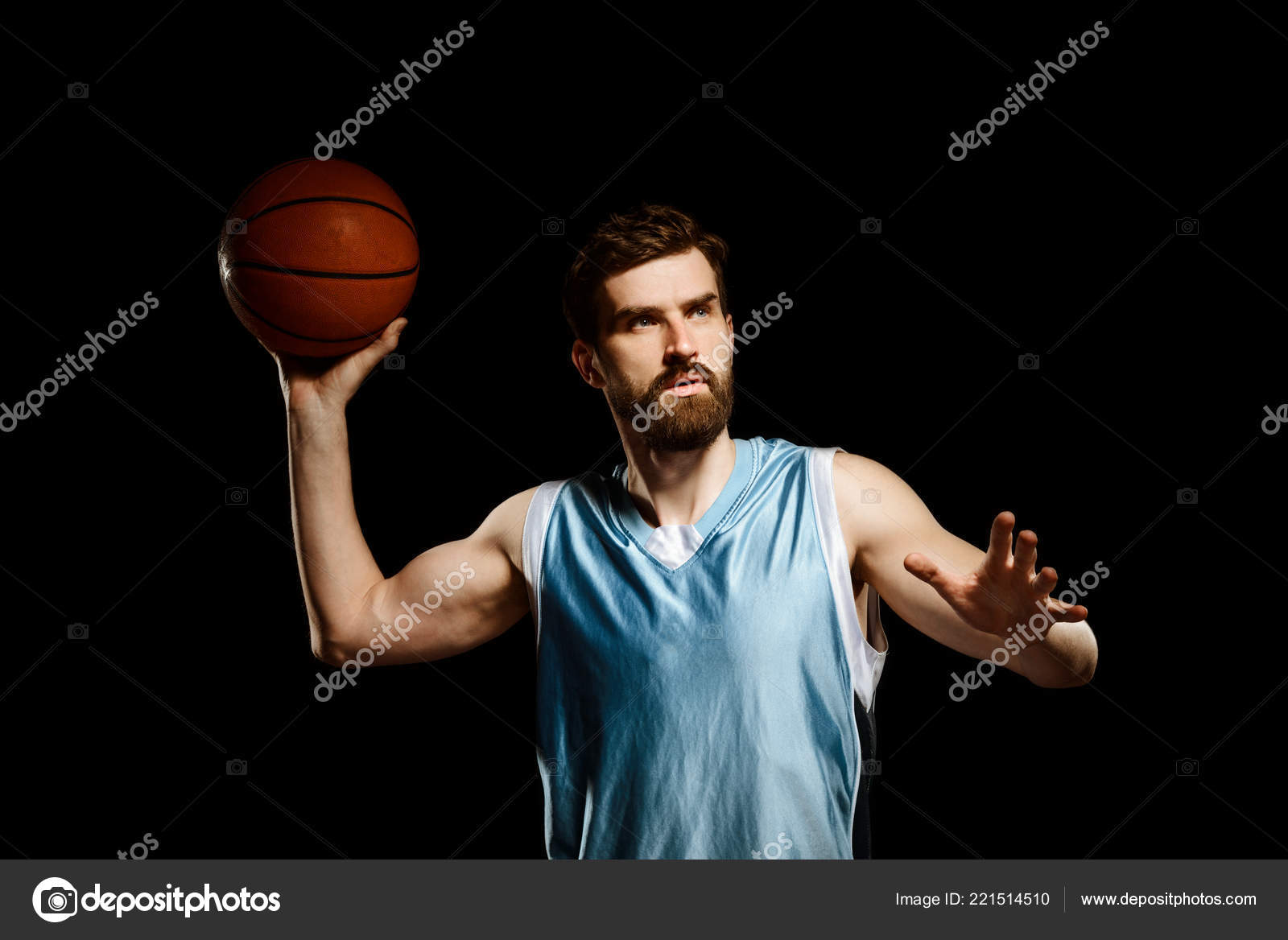 Handsome basketball player shooting ball Stock Photo by ©YGphoto 221514510