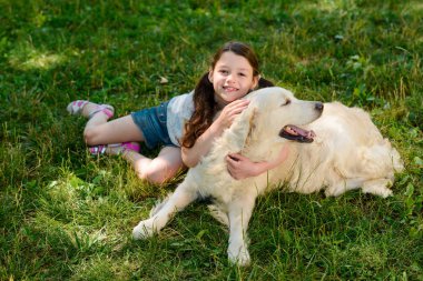 Girl and dog outdoors