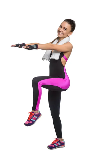 Mulher feliz fazendo exercícios de alongamento — Fotografia de Stock