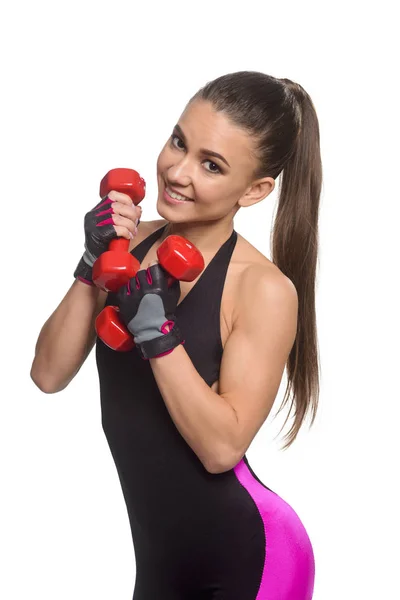Fitness model dumbbells ile poz — Stok fotoğraf