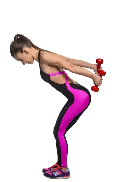 Fitness-Frau trainiert mit Kurzhanteln — Stockfoto
