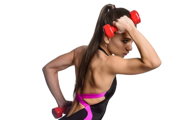 Muskulös kvinna arbetar kroppen ut — Stockfoto