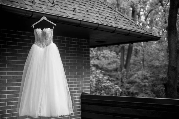 White wedding dress on hanger — Stock Photo, Image