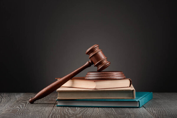 Gavel on top of books