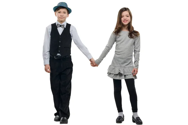 Chłopiec i dziewczyna trzymający się za ręce — Zdjęcie stockowe