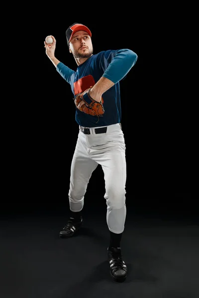 Ung mand spiller baseball - Stock-foto