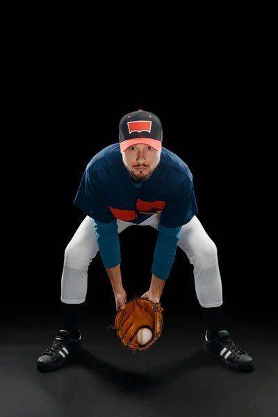 Pitcher fängt einen Ball — Stockfoto
