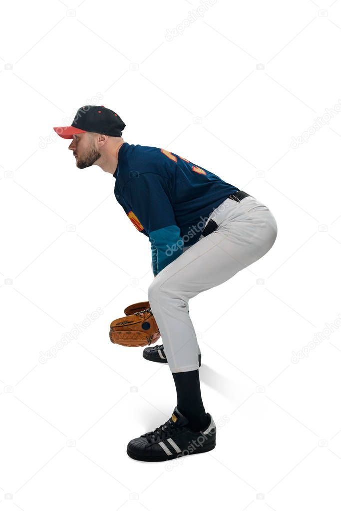 Baseball player pitching a ball