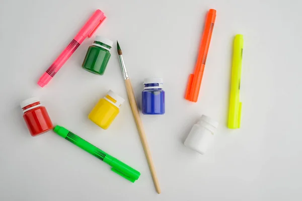 Pens, paint and brush — Stock Photo, Image