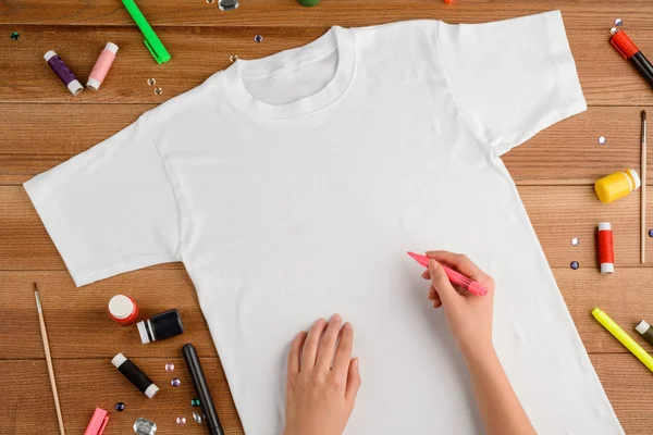 Craftswoman Sewing Patches To T-shirt Stock Photo - Image of brush
